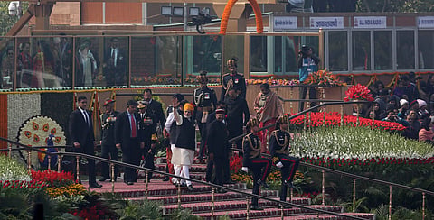 Prime Minister Narendra Modi waves as he leaves with President Ram Nath Kovind after the 69th Republic Day Parade at Rajpath in New Delhi on friday.  (Express photo by Shekhar yadav)