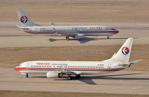China Eastern Airlines Boeing 737-800 planes are seen at an airport in Taiyuan, Shanxi province, April 6, 2014. (Photo | Reuters)