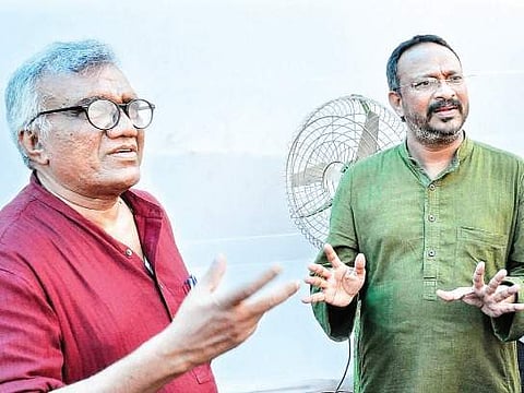 JNU professor Gopal Guru (left) and Ramon Magsaysay awardee Bezawada Wilson during a panel discussion at book festival in Vijayawada |  express