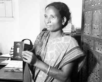 Dinja Jakesika shows her passport in panchayat office  | Express