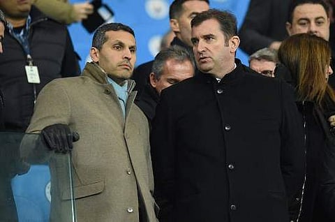 Manchester City Emirati chairman Khaldoon al-Mubarak (L) speaks with chief executive Ferran Soriano during the English Premier League football match between Manchester City and Tottenham Hotspur at the Etihad Stadium in Manchester, north west England, on 