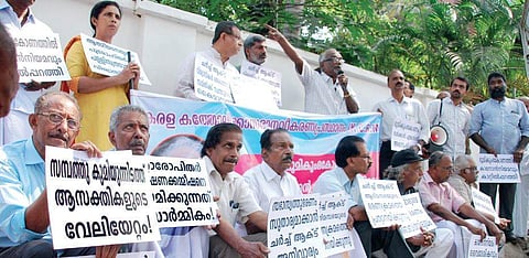 Participants at a meet conducted by KCRM, in connection with the land scam in the Catholic Church, in front of the Major Archbishop’s house  in Kochi |  K Shijith