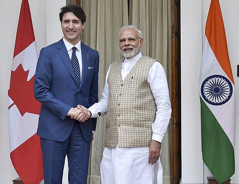 Prime Minister Narendra Modi shakes hands with his Canadian counterpart Justin Trudeau (Photo | PTI)