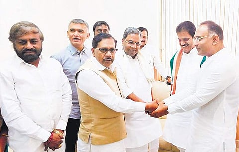 Congress leaders K C Venugopal, Siddaramaiah, Dinesh Gundu Rao, Eshwar Khandre and G Parameshwara  at a party meeting in Bengaluru on Tuesday | express