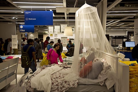 The Hyderabad store will  have a range of 7,500 items to sell. The company has planned to open 25 outlets in India. IN PIC: Indian customers check the furnishings inside IKEA's first store in India as it opened in Hyderabad.  (Photo | AP)