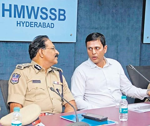 M. Mahender Reddy, DGP and (right) Rajat Kumar, CEO attend a workshop on election arrangement, in Hyderabad on Friday. | Sathya Keerthi
