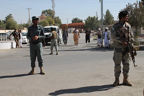 Security forces guard near Abdul Jabar Qahraman's house, a parliamentary election candidate, after he was killed in an explosion inside his home in Lashkar Gah, Capital of southern Helmand province, Afghanistan, Wednesday, Oct. 17, 2018. (Photo | AP)
