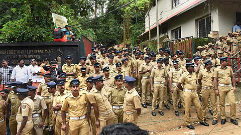 Heavy police force deployment near the Lord Ayyappa Temple on its opening day in Sabarimala. (Photo | PTI)