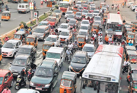 Vehicles stuck in heavy traffic for many hours at a junction in Hyderabad   | Sathya Keerthi