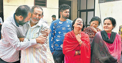 Relatives of victims of the train accident break down at the Civil Hospital in Amritsar on Saturday | PTI
