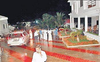 People thronging outside a resort in Courtallam, where 3 sitting MLAs are said to have taken shelter in. | Express Photo Services
