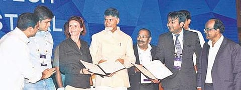CM N Chandrababu Naidu exchanging MoU with representatives of companies  at the Fintech Festival at Hotel Novotel in Vizag on Tuesday G satyanarayana