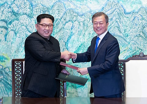 Kim Jong Un and Moon Jae-in  (Photo | AP)