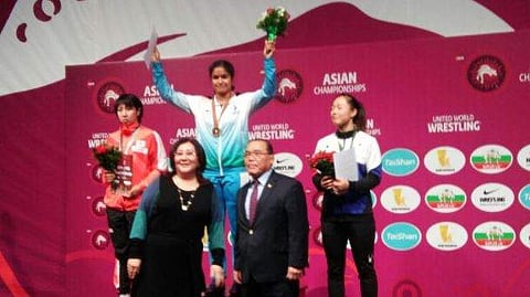 Wrestler Navjot Kaur (being carried) in a file photo.