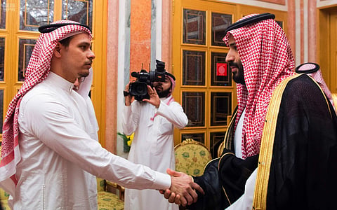 In this photo released by Saudi Press Agency, SPA, Saudi Crown Prince Mohammed bin Salman, right, shakes hands with Salah Khashoggi, a son, of Jamal Khashoggi, in Riyadh, Saudi Arabia. (Photo | AP)