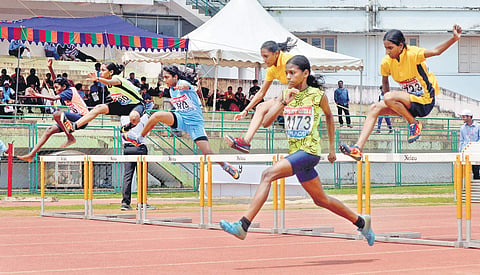 A hurdles race at the 62nd State School Athletics Championship in Thiruvananthapuram on Friday. | Vincent Pulickal