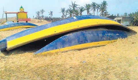 Boats damaged by cyclone Titli in Vajrapu Kotturu mandal in Srikakulam district | EXPRESS