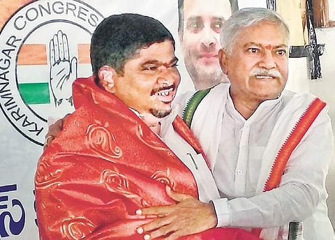 DCC president Katakam Mruthyunjayam felicitating TPCC working president Ponnam Prabhakar in Karimnagar on Wednesday .| Express Photo Services