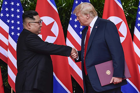 North Korea leader Kim Jong Un and US President Donald Trump shake hands at the conclusion of their meetings (File Photo | AP)