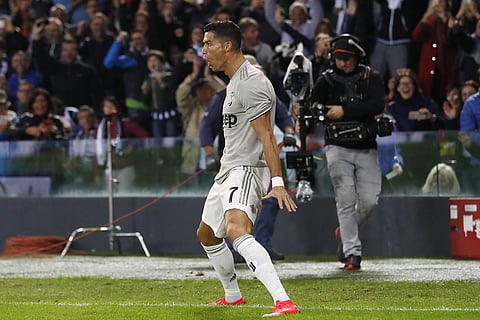 Juventus's Cristiano Ronaldo celebrates after scoring during the Serie A soccer match between AC Udinese and Juventus at the Dacia Arena Stadium, in Udine. (Photo | AP)