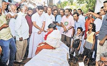 A file pic of Preetha Shaji during the indefinite hunger strike in front of her house Express