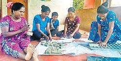 Tribal people of Karikkadav making soaps