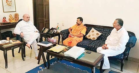 BJP chief Amit Shah, Paripoornananda and ex-MLA NVSS Prabhakar in Delhi on Monday|  Express