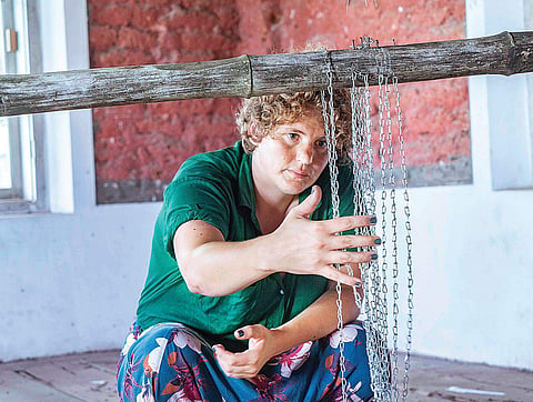 Swanoop John/Lisa Premke working on her installation