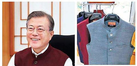 South Korean President Moon Jae-in tweeted a photo of him wearing one of the four ‘MODI Jackets’ that PM Narendra Modi sent him. | Image Courtesy: Twitter
