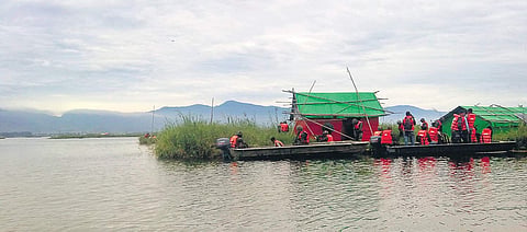Some Phumdis, or masses of floating vegetation in Loktak lake, are so large people have made houses there  | Express