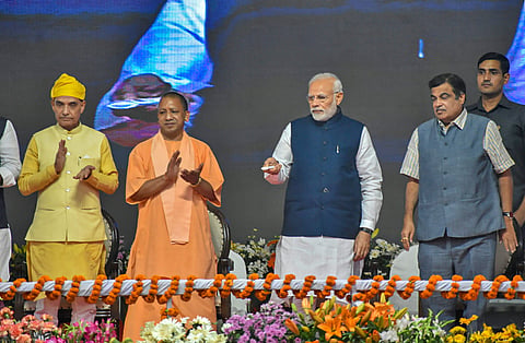 Prime Minister Narendra Modi inaugurates India's first multi-modal terminal on the Ganga river in Varanasi Monday Nov 12 2018. Also seen are Union Transport Minister Nitin Gadkari Uttar Pradesh Chief Minister Yogi Adityanath and UP BJP chief Mahendra Nath