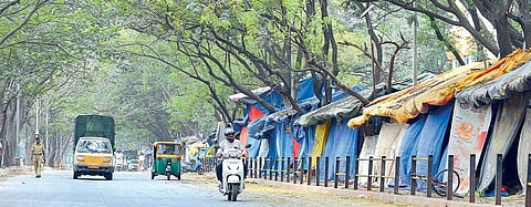 : Regular commuters in Madiwala can now breathe a sigh of relief, as they find that the traffic on Madiwala market road has reduced considerably | EPS