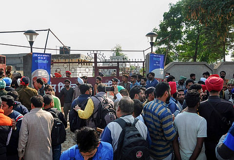 olice personnel and the media at the Nirankari Bhawan where two men on a motorcycle reportedly threw a grenade during a religious ceremony in Rajasansi village near Amritsar Punjab Sunday. (Photo | PTI)