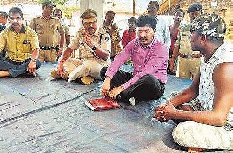 RDC D V Swamy interacting with villagers at Balarampur in Dhenkanal on Tuesday  | Express