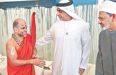 Deputy Prime Minister of UAE, Saif Bin Zyed Al Nahyan commends Sri Sri Sugunendra Theertha Swamiji after his address at the Interfaith Alliance Summit in Abu Dhabi  on Tuesday | Express