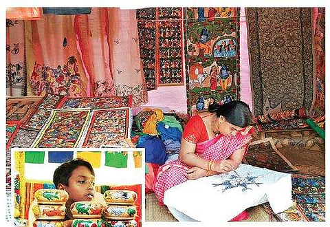A patua painter at work; (inset) A boy  peeps over bottles painted by the scroll painters Aishik Chanda, Samrat Maity (Photo | EPS)