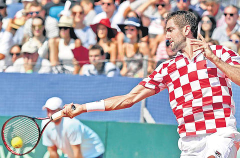 Marin Cilic's Croatia will be slight favourites despite having to face France on clay (File | AFP)