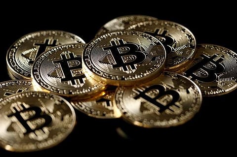 A collection of Bitcoin (virtual currency) tokens are displayed in this picture illustration.| REUTERS
