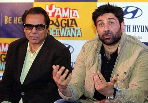 Bollywood actors Dharmendra (L) and Sunny Deol (File | PTI)