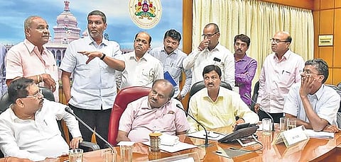 Chief Minister H D Kumaraswamy and Dy CM G Parameshwara at a meeting with owners of sugar mills in Bengaluru on Thursday