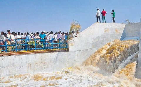 People seen cheering as the Tummilla irrigation project is inaugurated in Jogulamba Gadwal district on Saturday | Express
