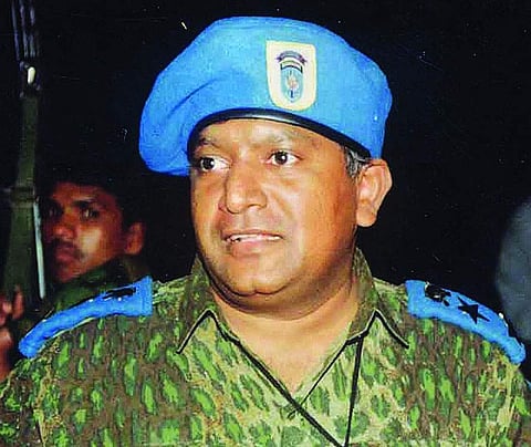 This undated photograph released by Sri Lankan Defence Ministry (MoD) reportedly taken from a recovered family photo album of LTTE leader Velupillai Prabhakaran. (File | AFP)