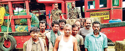 Arrested fishermen and their seized trawler at Gahirmatha  | Express