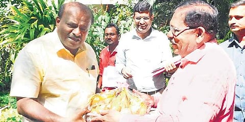 Chief Minister H D Kumaraswamy being greeted by his deputy G Parameshwara  on the occasion of Deepavali in Bengaluru on Wednesday | Express