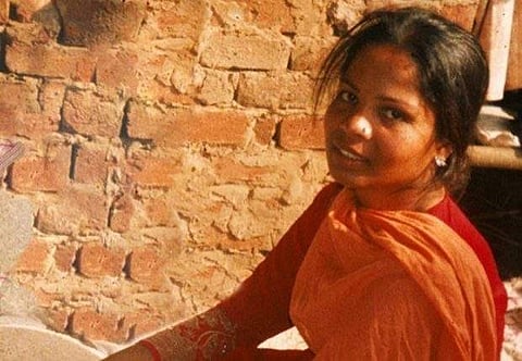 Asia Bibi, a Pakistani Christian woman, listens to officials at a prison in Sheikhupura near Lahore, Pakistan. (Photo | Twitter)