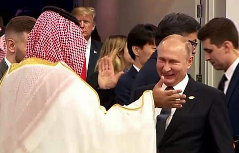 Saudi Crown Prince Mohammed bin Salman and  Vladimir Putin. (Photo | AFP)