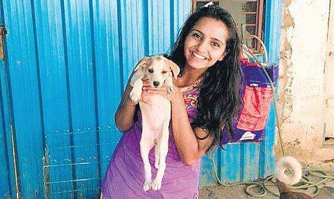 Sneha Suhas holds an indie puppy (Photo| EPS)
