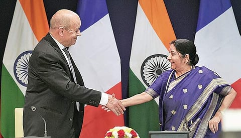 External Affairs Minister Sushma Swaraj and Minister of Europe and Foreign Affairs of France, Jean-Yves Le Drian, shake hands after a joint Press meet in Delhi  | PTI