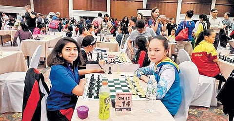 Anya Seth Syed (left)  at one of chess tournaments