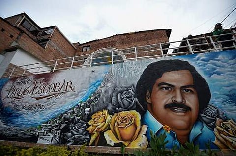 A graffiti of late Colombian drug lord Pablo Escobar at the neighbourhood that has his name in Medellin, Colombia on September 8, 2017. (Photo: AP)